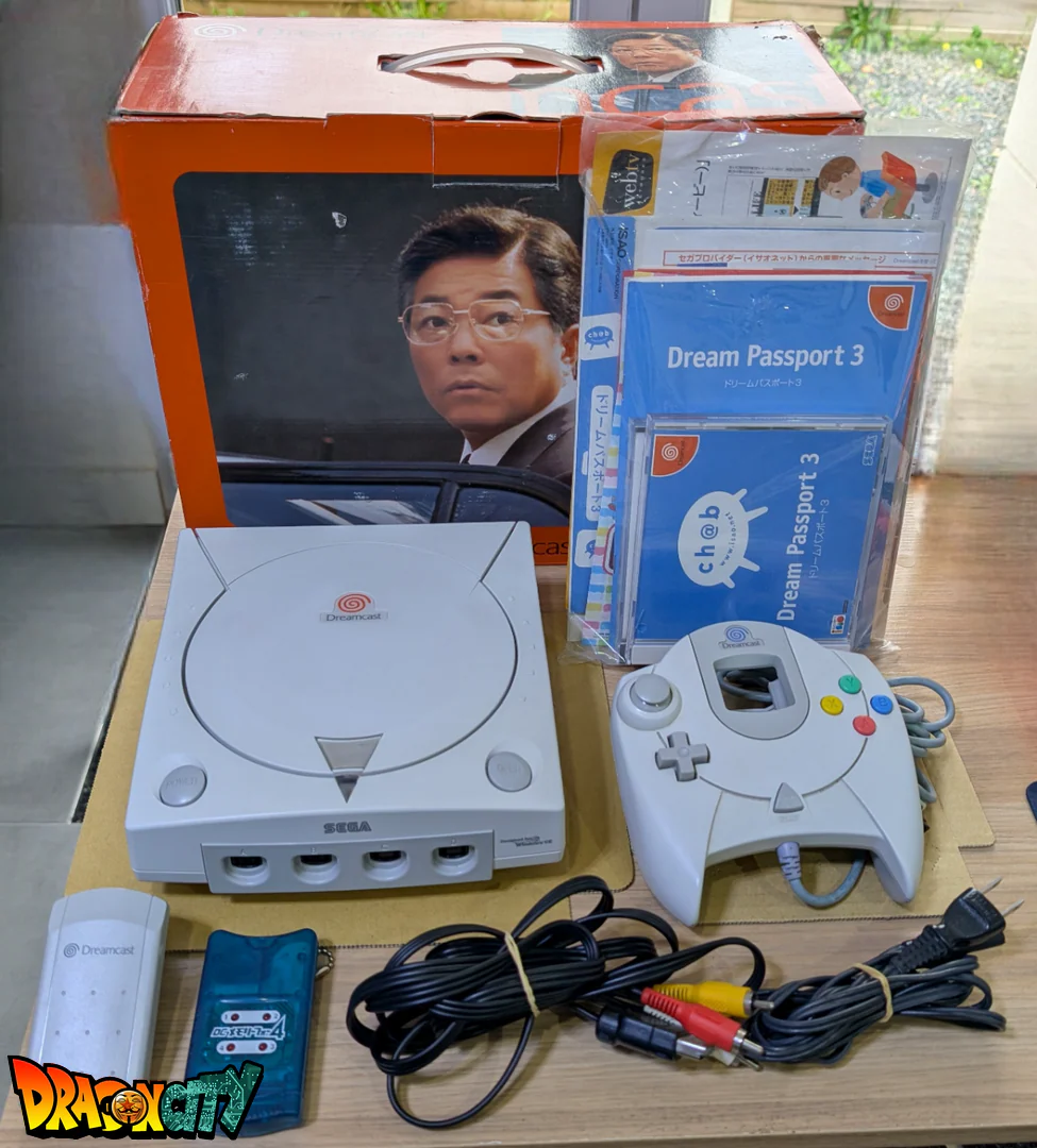 Dreamcast VA0 60Hz + Bios Freezone + Patch 50Hz/60Hz Auto + Boßte + Alimentation 220V + 1 Manette + Notices + Dream Passport 1 et 3 + Cùble Vidéo + Cùble Alimentation + Serial Matching + Cùble RJ11 + Condensateurs GDROM changés (neuf) + VMU + Jump Pack