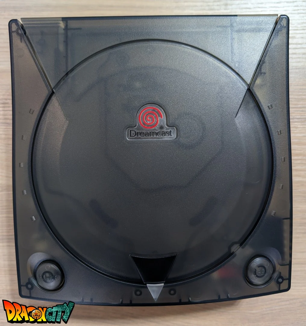 Dreamcast VA1 Freezone 60Hz + Coque Noire Translucide (Neuve) + Alimentation Dc-Psu + GDEmu 5.20.5 + Kit 3D GDEmu Noir Translucide + Pile Neuve + Polyfuse + Ventilateur Silencieux + Patch 50Hz/60Hz Auto