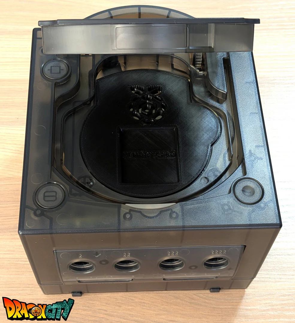 GameCube JAP 60Hz + Coque Translucide Noire (Neuve) + Picoboot + Cache lecteur 3D + Sandisk Swiss 512Go + SD2SP2 PRO V2