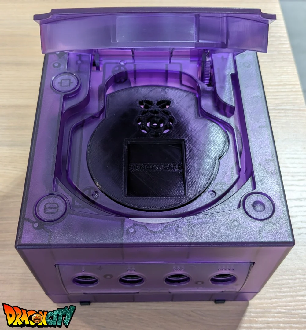 GameCube JAP 60Hz + Coque Translucide Violette (Neuve) + Picoboot + Cache lecteur 3D + Sandisk Swiss 512Go + SD2SP2 PRO V2
